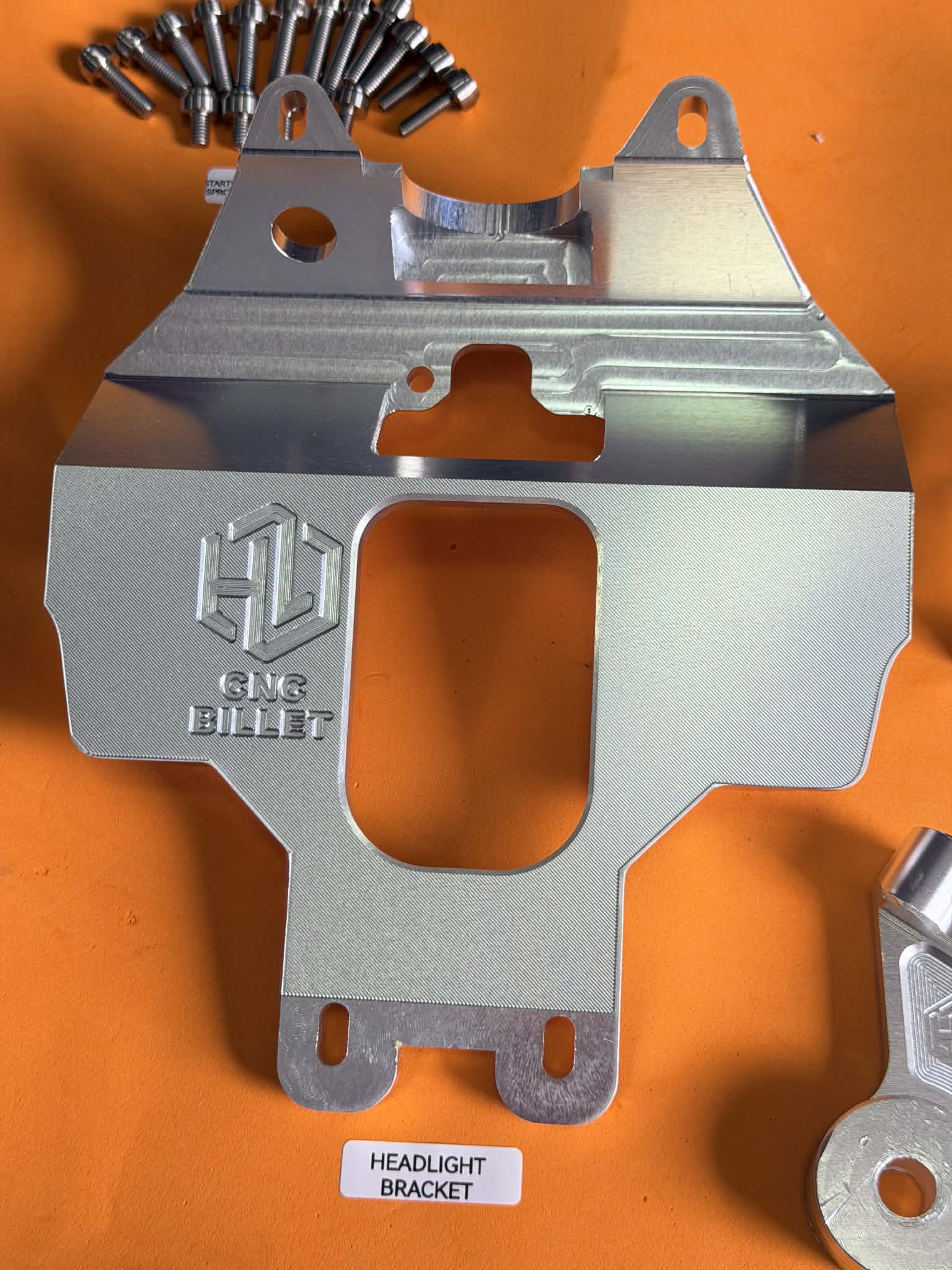HEADLIGHT BRACKET RAIDER FI